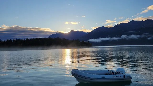 A dinghy on the lake in the evening light