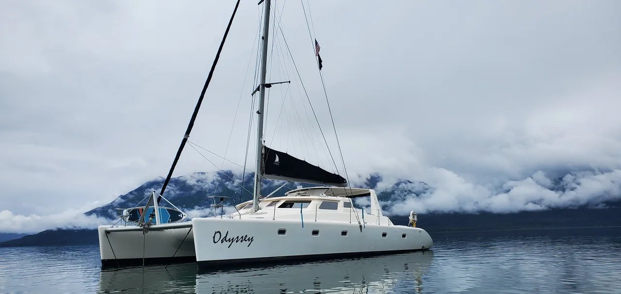 Odyssey at home on Lake Clark, with mist along the mountains behind her